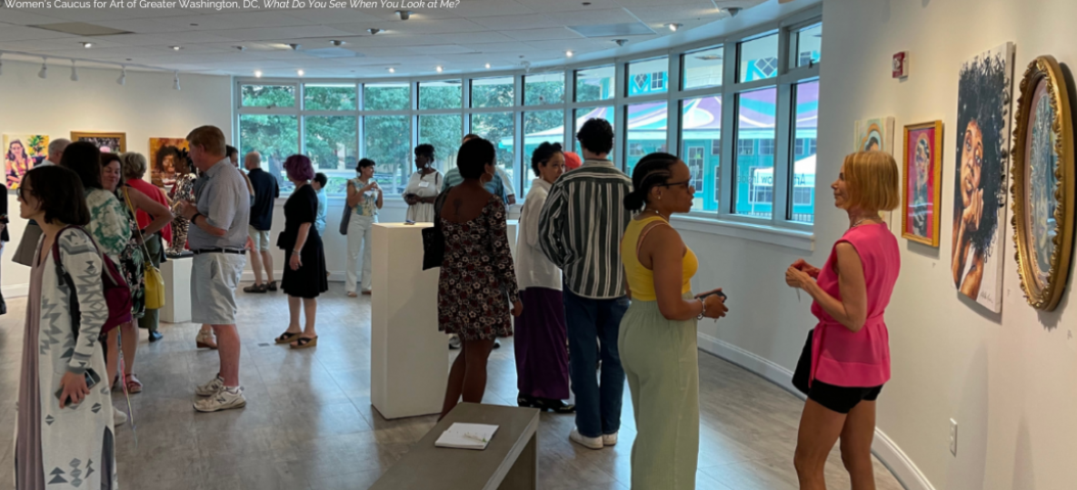 Visitors view artwork in the Popcorn Gallery